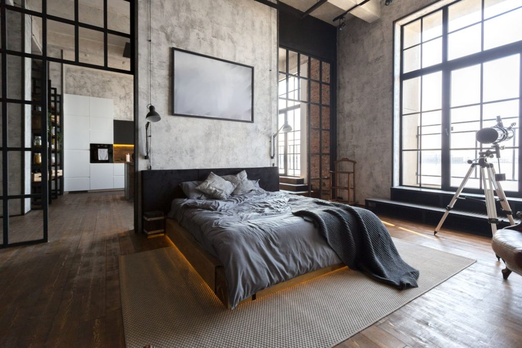 Concrete walls and ceiling in the interior of the apartment