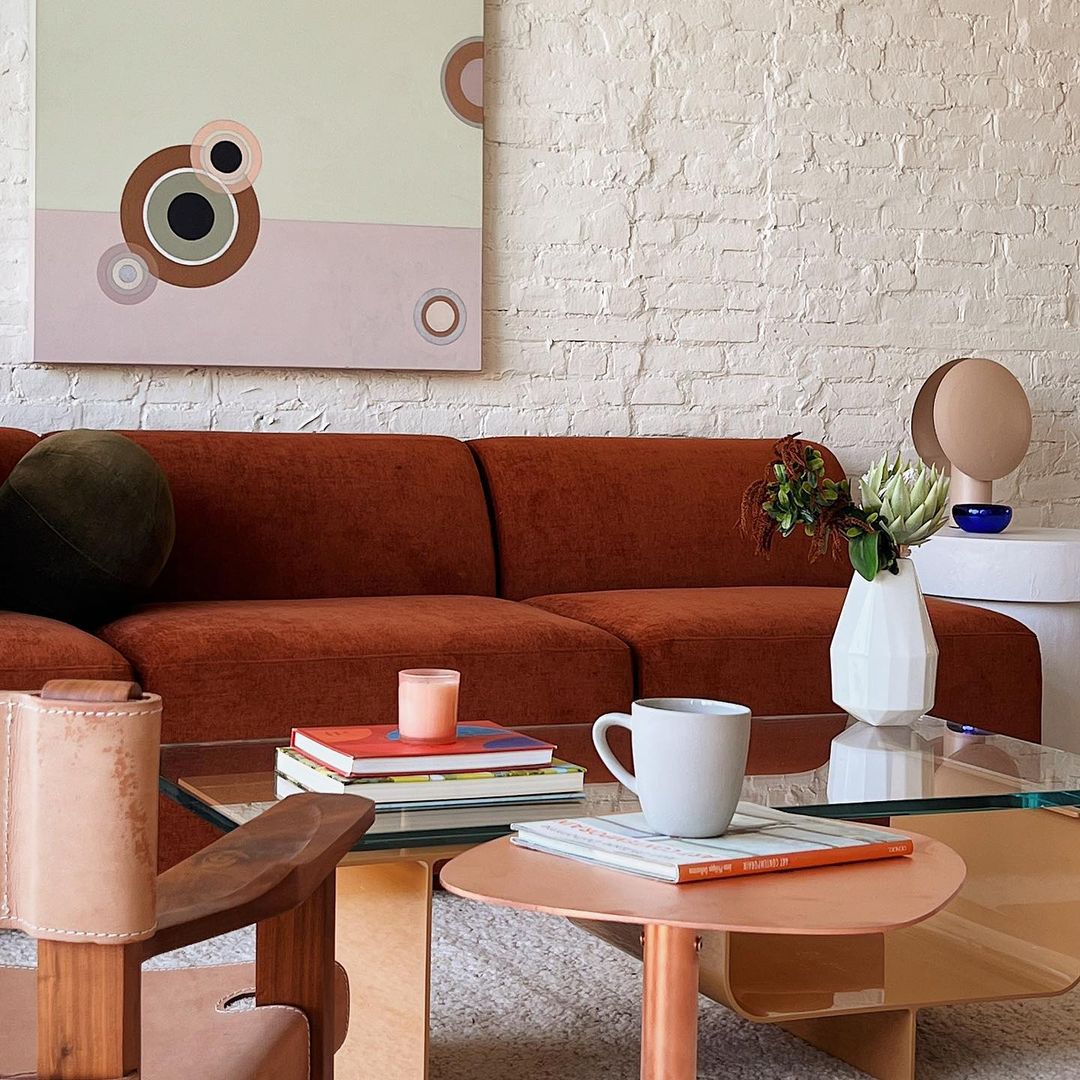 Modern and comfortable orange sofa in the living room