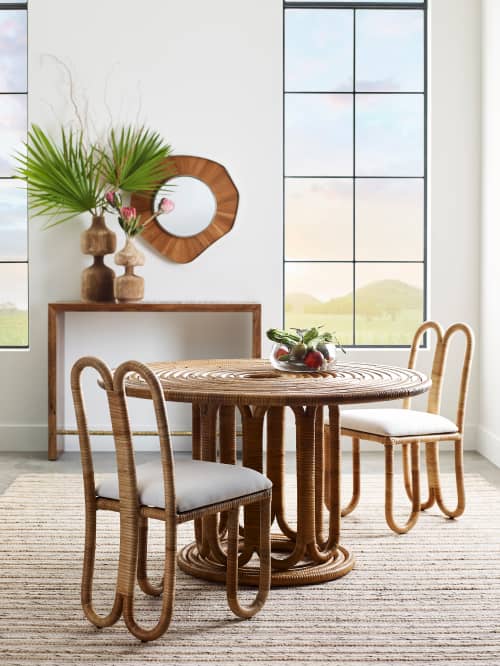 Rustic sensibility with woven rattan, brushed gold,  terracotta and intricate wood inlays.