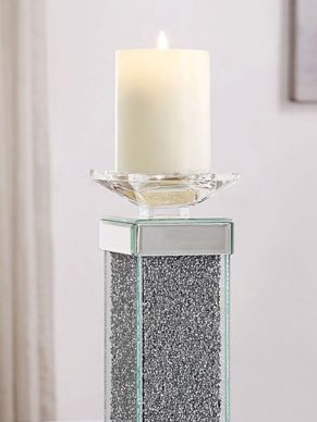 Transparent candle holder with gray filler