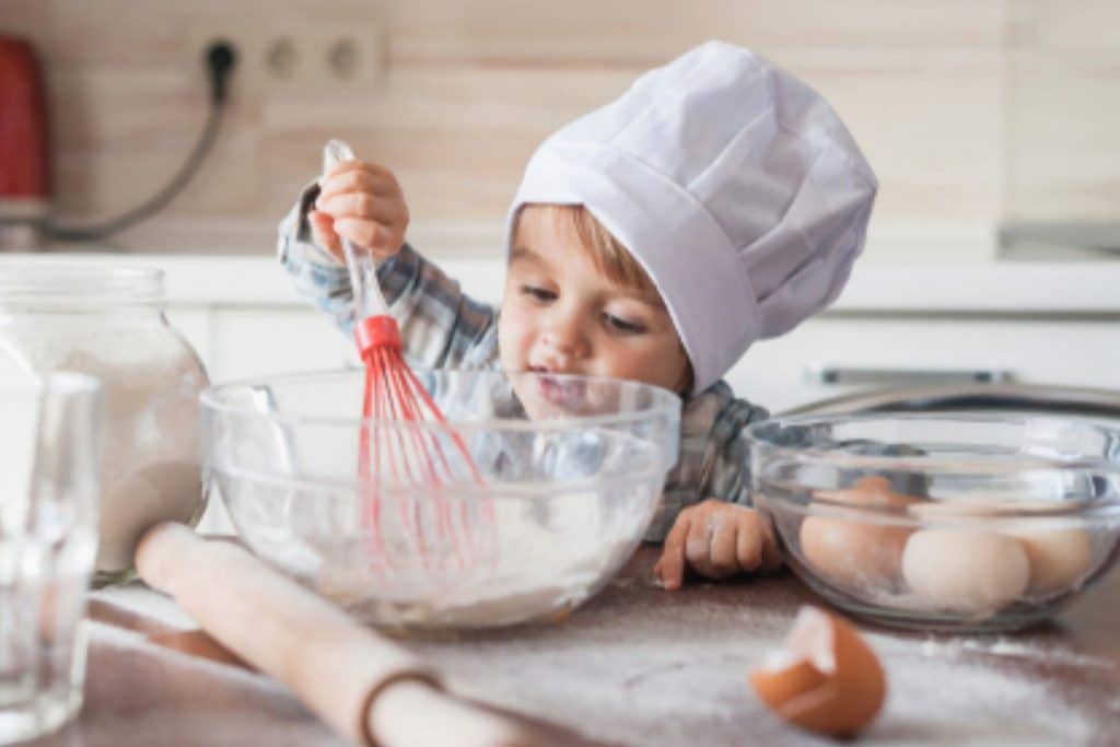 Kid In Kitchen Cooking