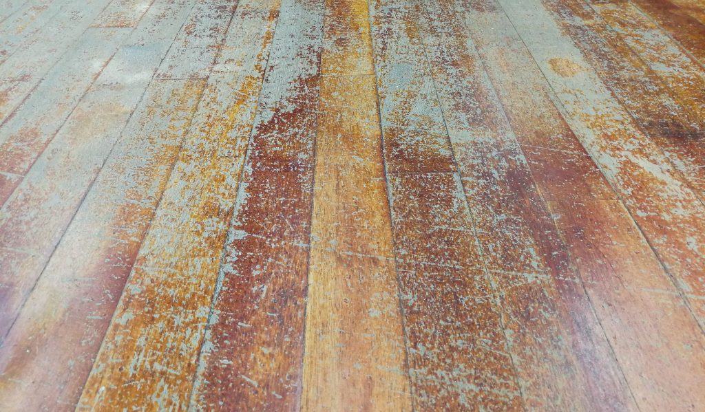 Corroded,And,Damaged,Seasoned,Wooden,Floor,Plank,With,Scratch,Marks
