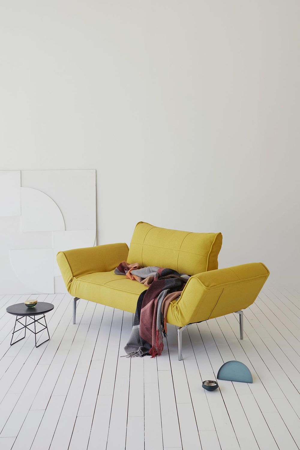Innovation Living™ Zeal Straw Daybed - 554 Soft Mustard Flower is a yellow sofa bed that comes in many colors and folds and unfolds as you need