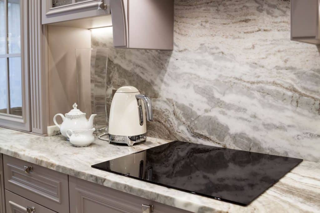 Kitchen Stove And Ceramic Backsplash Brown