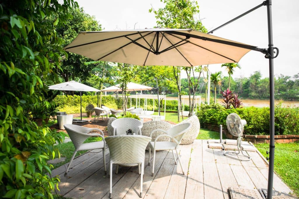 Umbrellas In Garden Table