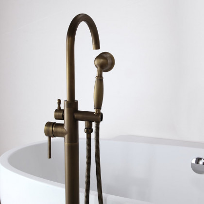 HMR - Swirling Spout Freestanding Tub Faucet with Handshower in Brass