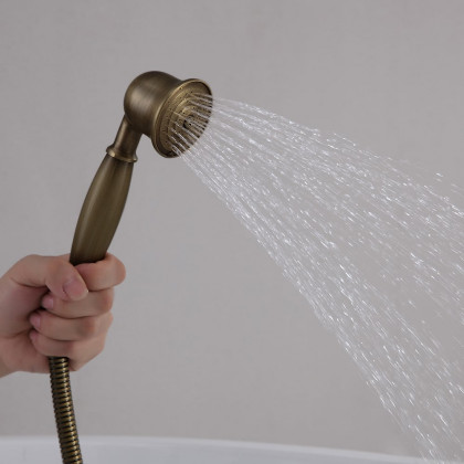 HMR - Swirling Spout Freestanding Tub Faucet with Handshower in Brass