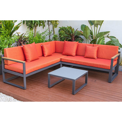 LeisureMod Chelsea Black Sectional with Adjustable Headrest and Coffee Table with Cushions - Orange