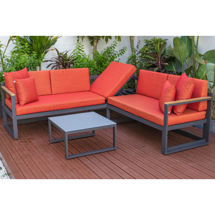 LeisureMod Chelsea Black Sectional with Adjustable Headrest and Coffee Table with Cushions - Orange