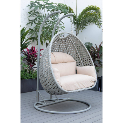 LeisureMod Mendoza Light Gray Wicker Hanging 2 Person Egg Swing Chair with Cushions - Beige