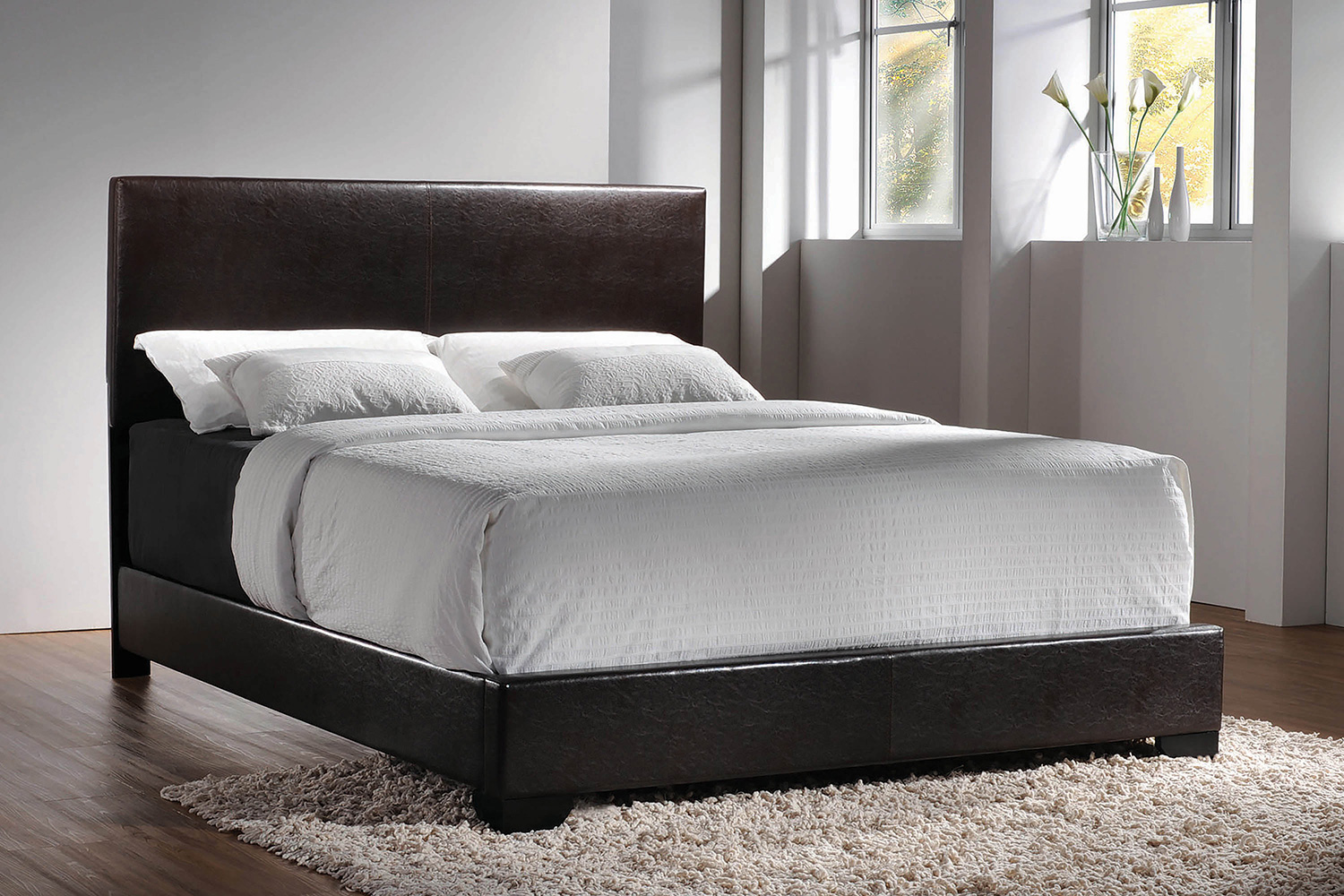 Coaster Conner California King Upholstered Panel Bed - Dark Brown
