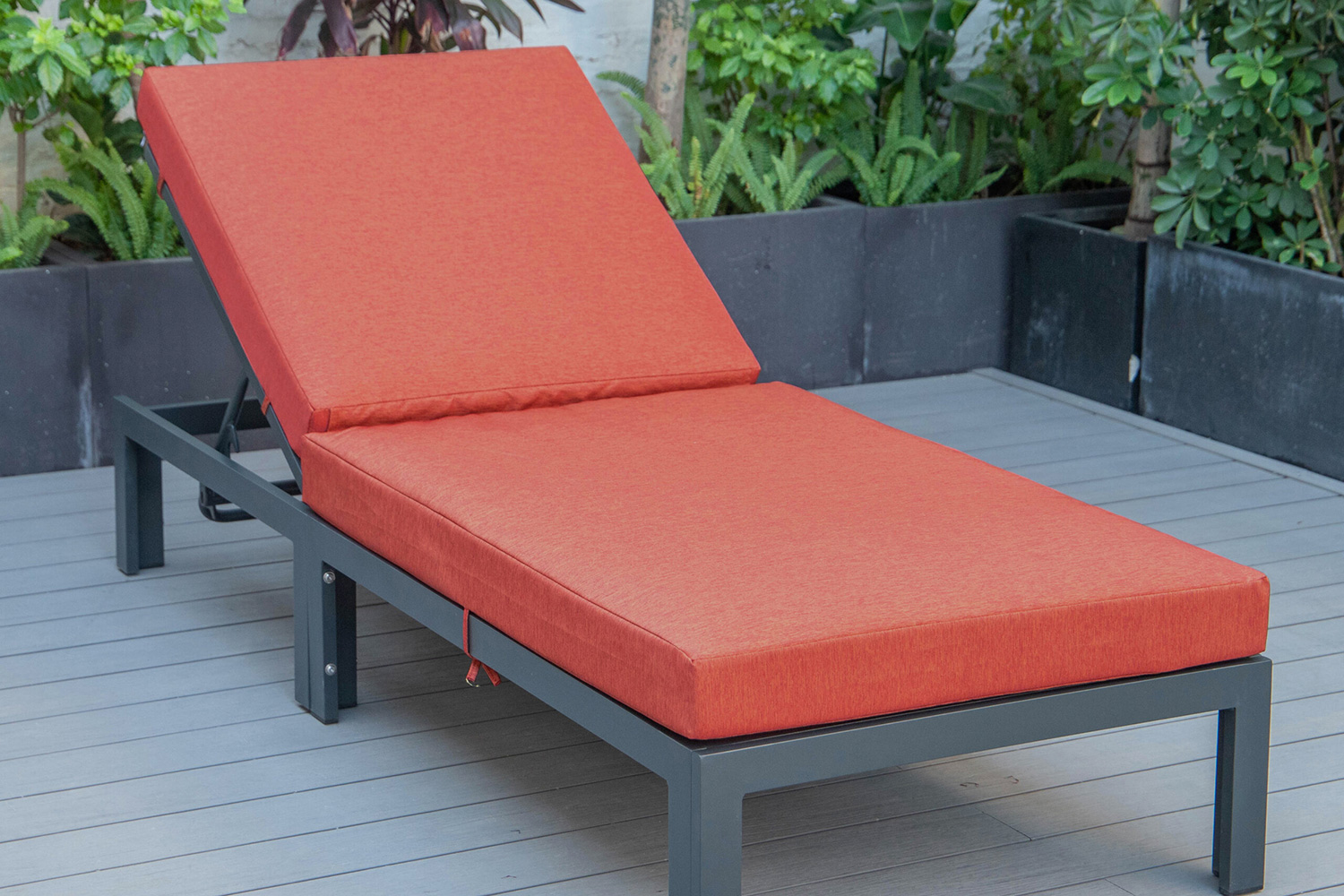 LeisureMod Chelsea Modern Outdoor Black Chaise Lounge Chair with Cushions - Orange
