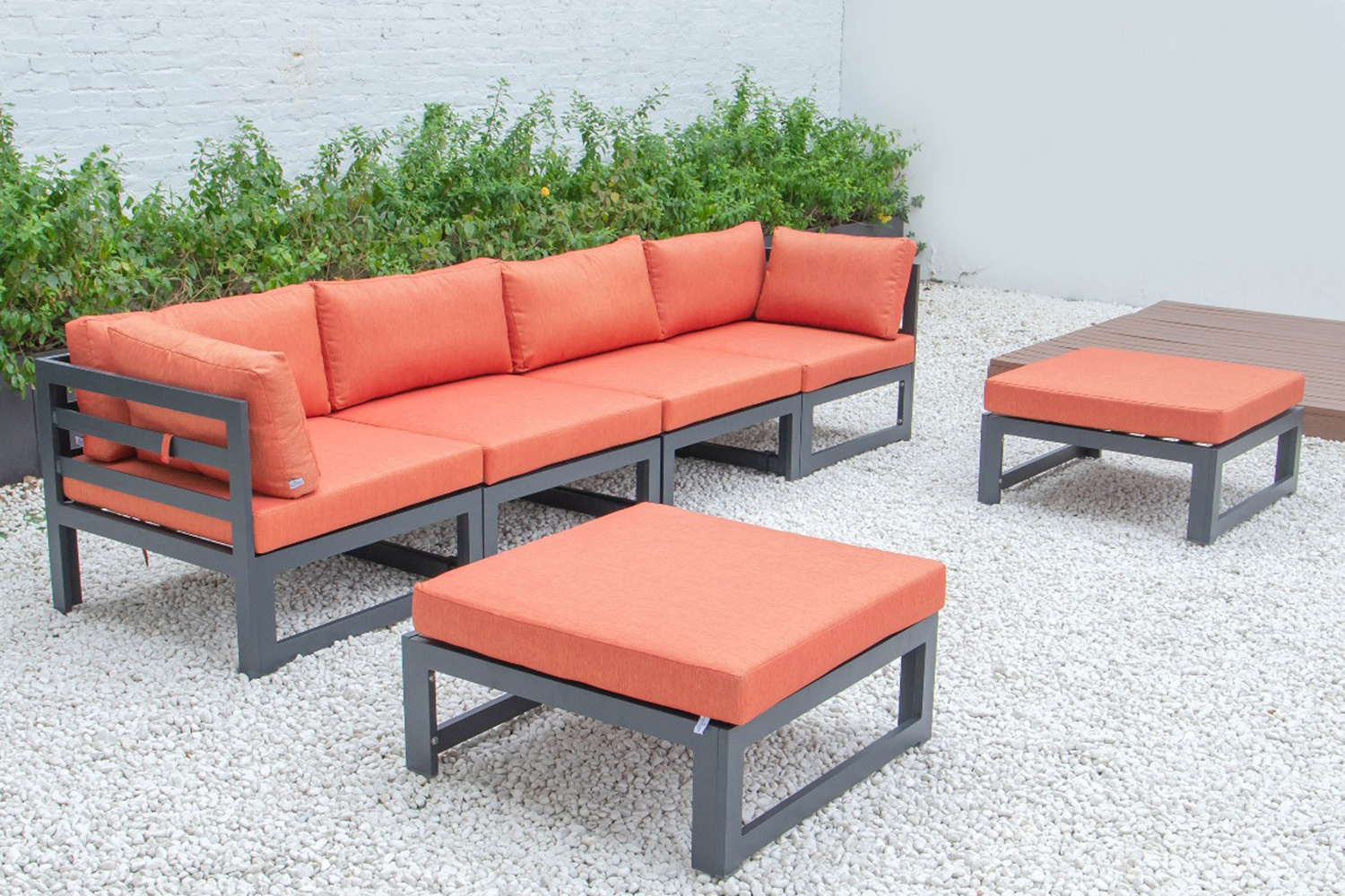LeisureMod Chelsea 6-Piece Patio Ottoman Sectional Black Aluminum with Cushions - Orange