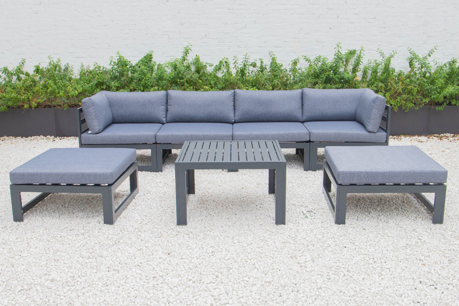 LeisureMod - Chelsea 7-Piece Patio Ottoman Sectional and Coffee Table Set Black Aluminum with Cushions